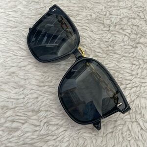 Stylish Black Sunglasses with Gold Accents